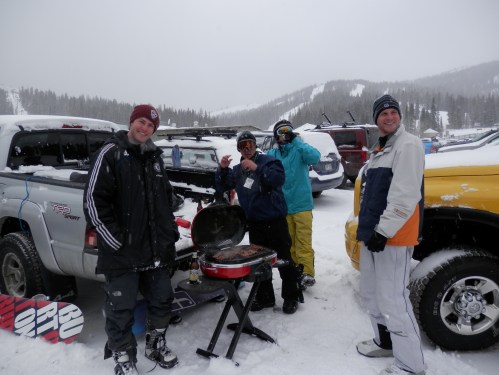 Tailgate party on the parking lot. Only seen when everyone's happy it's snowing
